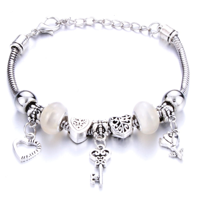 Pulseira feminina berloques metal 925